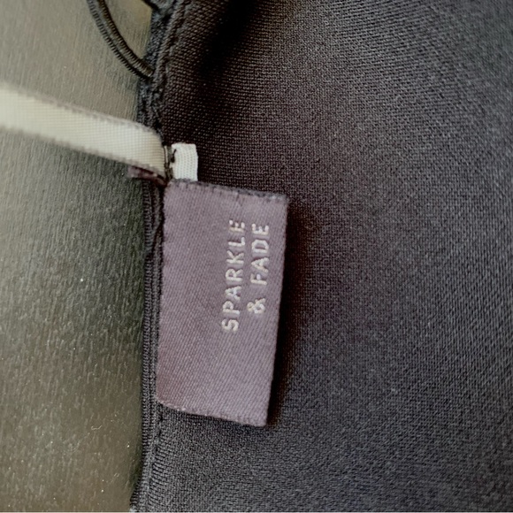 Black mini dress with cross straps - Picture 3 of 3